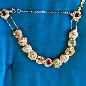 Elegant Gold and Gemstone Bracelet